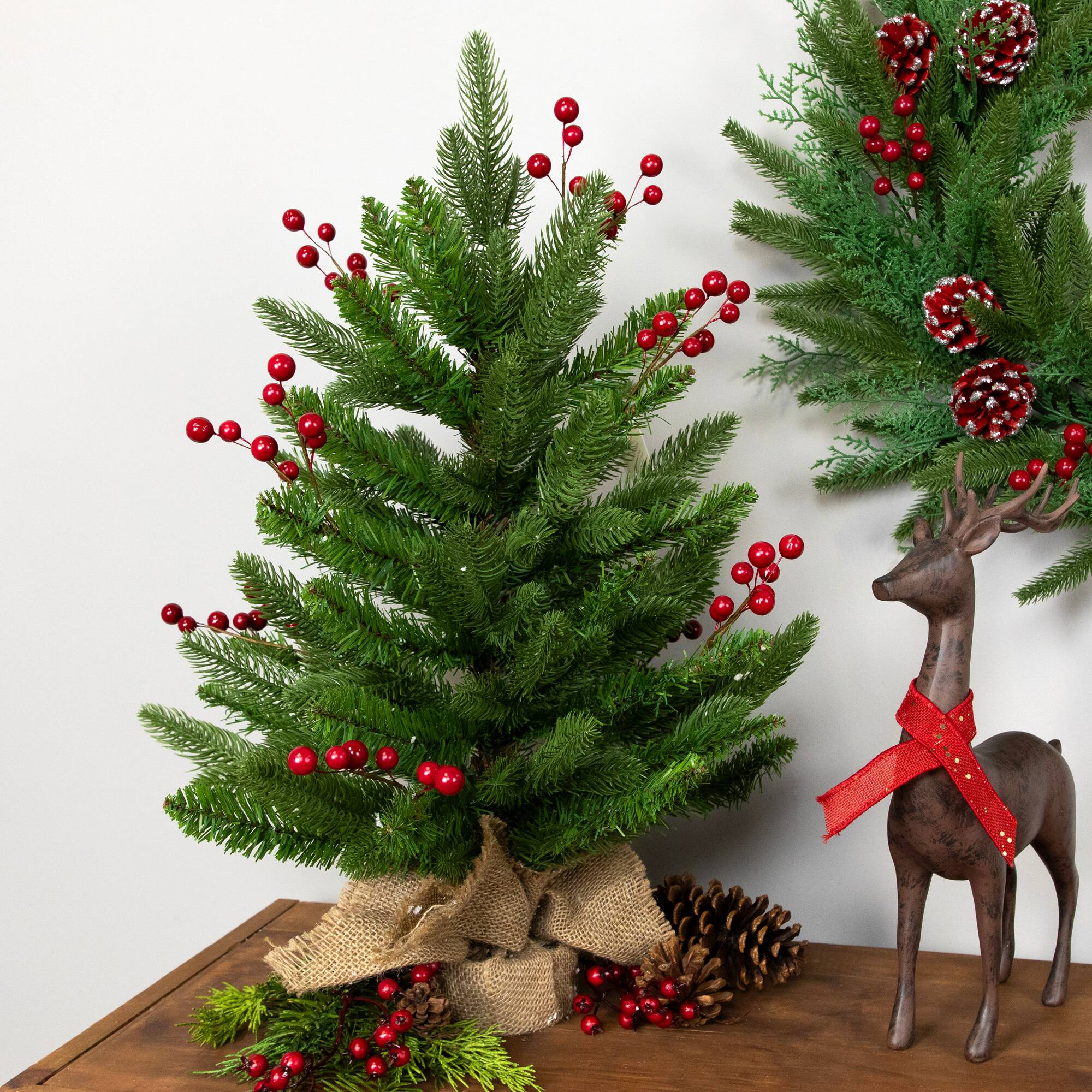 24" Unlit Real Touch™ Sarasota Pine Mini Artificial Christmas Tree in Burlap Base